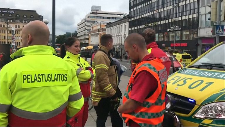 Emergency service workers at the scene of a stabbing in Finland