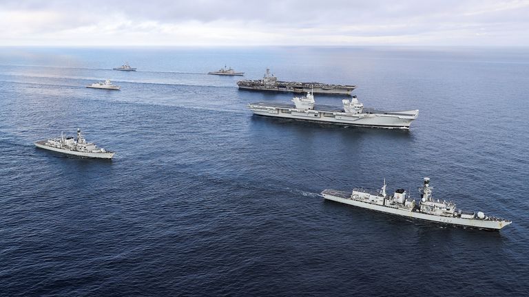 HMS Elizabeth (second from right) sails with the USS George HW Bush and her carrier strike group