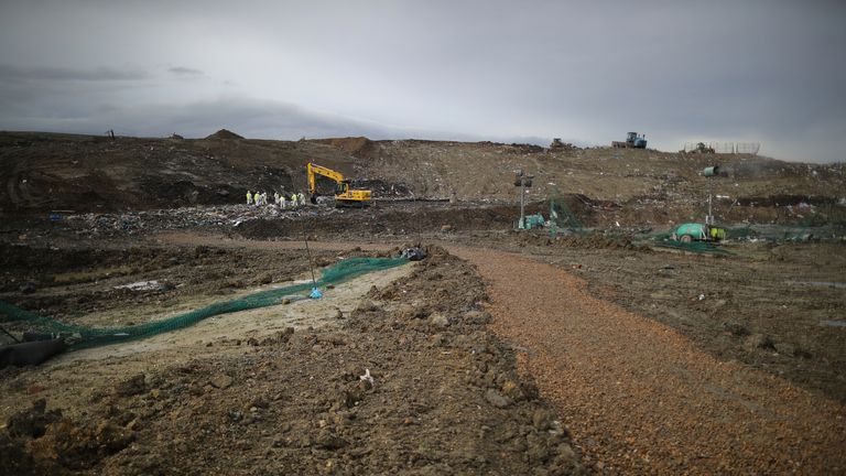 MILTON, ENGLAND - MARCH 08: Police officers search a landfill site in search of missing RAF airman Corrie Mckeague on March 8, 2017 in Milton, near Cambridgeshire in England. 