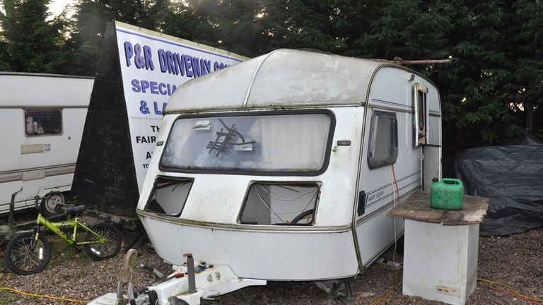 A caravan where men were forced to live by the Rooneys