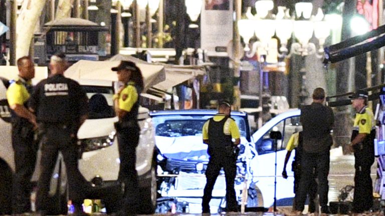 A damaged van, believed to be the one used in the attack on Las Ramblas