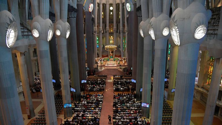 People attend a mass to commemorate victims of two devastating terror attacks in Barcelona and Cambrils