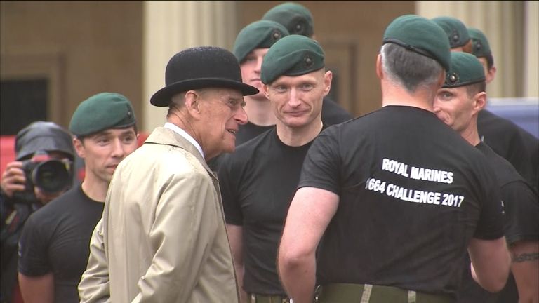 Prince Philip meets with Royal Marines during his final solo royal engagement before retirement