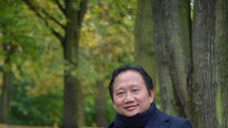 Vietnamese national Xuan Thanh sitting on a park bench in Berlin