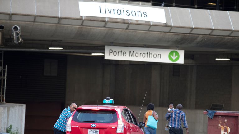A family arrives at the Olympic Stadium in Montreal