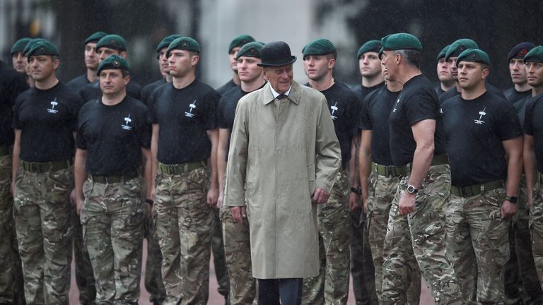 Prince Philip meets Royal Marines during his final solo royal engagement before retirement