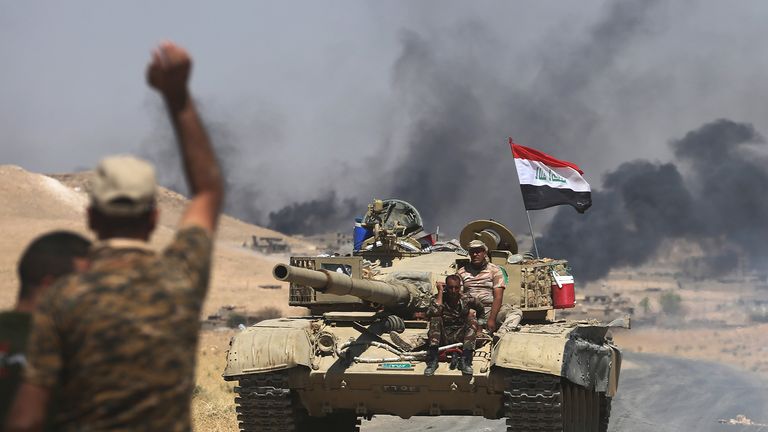 Iraqi forces had been battling IS fighters' last stand in the nearby town of al Ayadiya