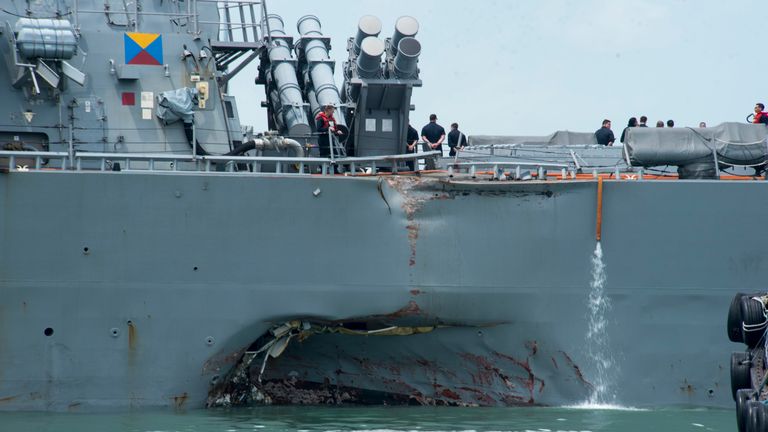 Damage to the ship&#39;s port side is clearly visible. Pic: US Navy