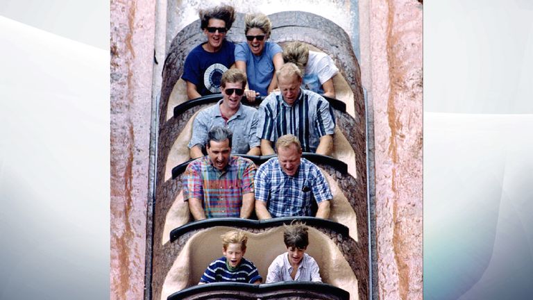 Aug 1993: Diana ducks whilst descending a log flume water ride, Splash Mountain, at Walt Disney World in Florida.  Prince Harry is shown front left