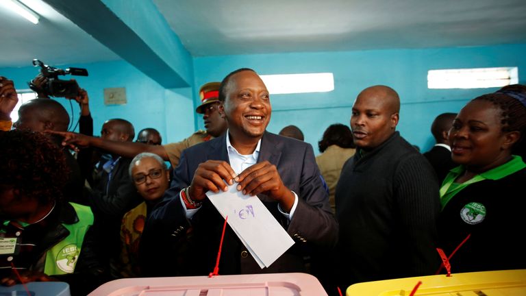 President Uhuru Kenyatta casts his vote in the election