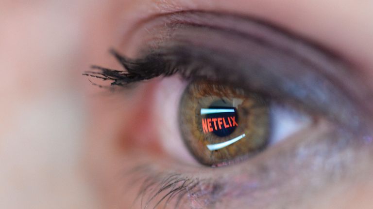 In this photo illustration the Netflix logo is reflected in the eye of a woman on September 19, 2014 in Paris, France