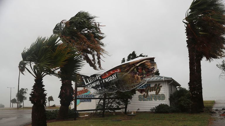 A sign blows in the wind in Corpus Christi, Texas