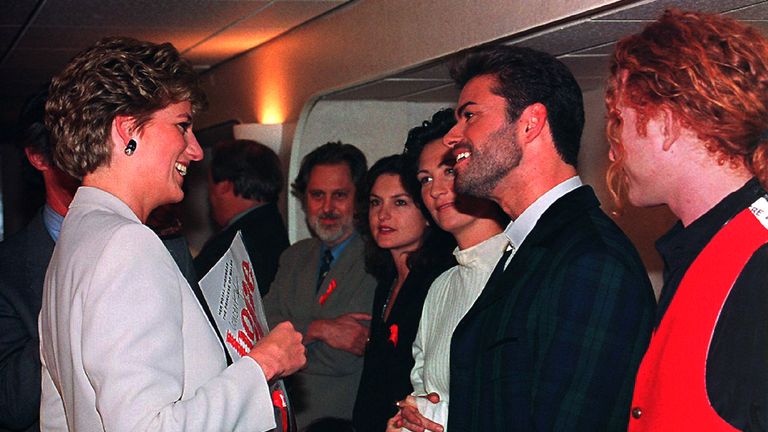 Dec 1993: Diana , Patron of the National AIDS Trust chats with singer George Michael before the start of the Concert of Hope in London to mark World AIDS Day