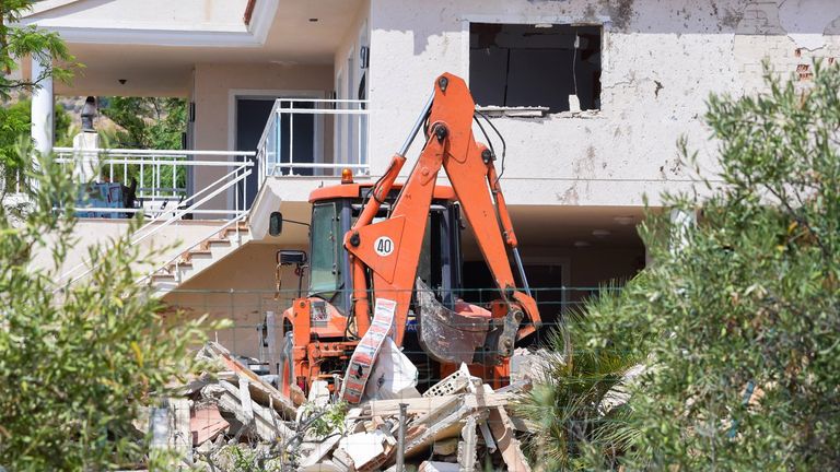 The rubble of a house where suspects of this week&#39;s twin assaults in Spain