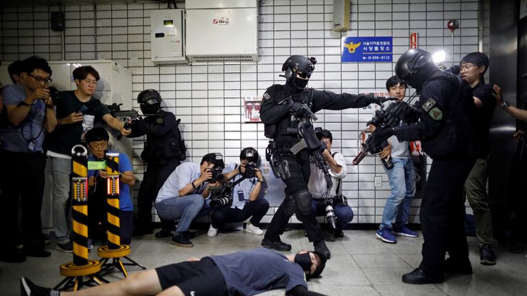 Members of SWAT take part in an anti-terror drill as part of the Ulchi Freedom Guardian exercise in Seoul...