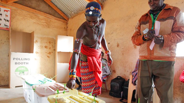 A Kenyan Samburu warrior votes in Nkirish, in the Eastern Province of Kenya.