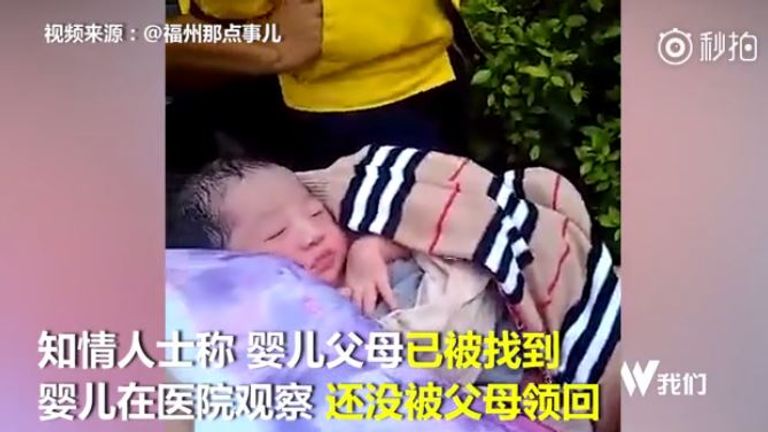 Baby rescued after its mother tried to post it to an orphanage in China
