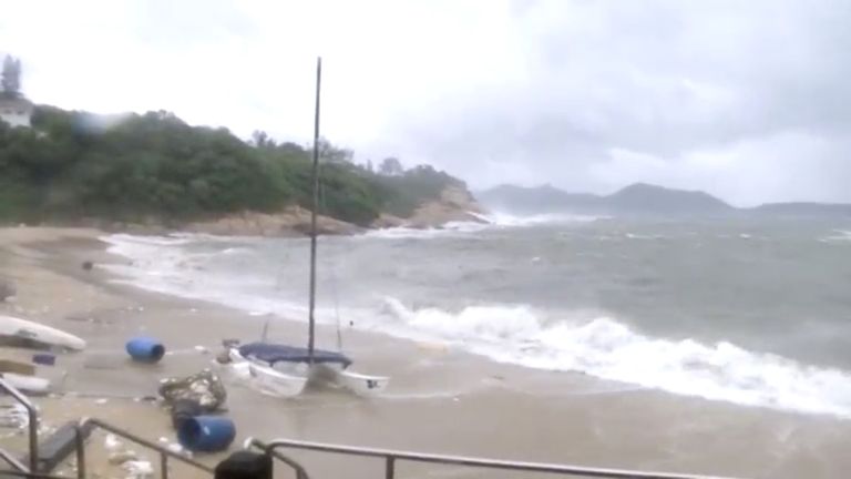 Waves crash on Shek O Beach, during Typhoon Hato in Hong Kong