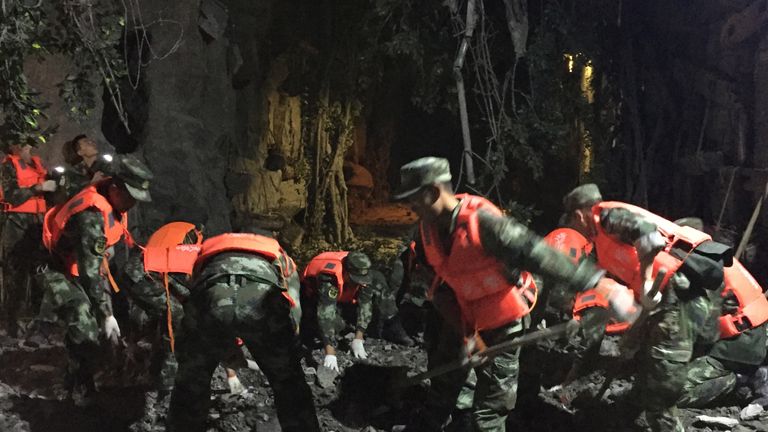 Chinese paramilitary police search for survivors after an earthquake in Sichuan province