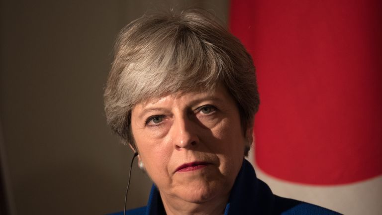 Theresa May pauses during a press conference with Japan's Prime Minister Shinzo Abe on August 31, 2017 in Tokyo, Japan. 