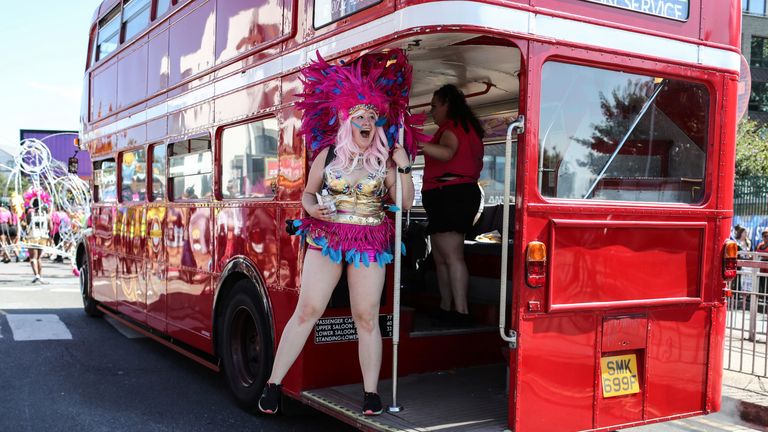 A young reveller takes part in the children's parade during the Notting Hill Carnival 