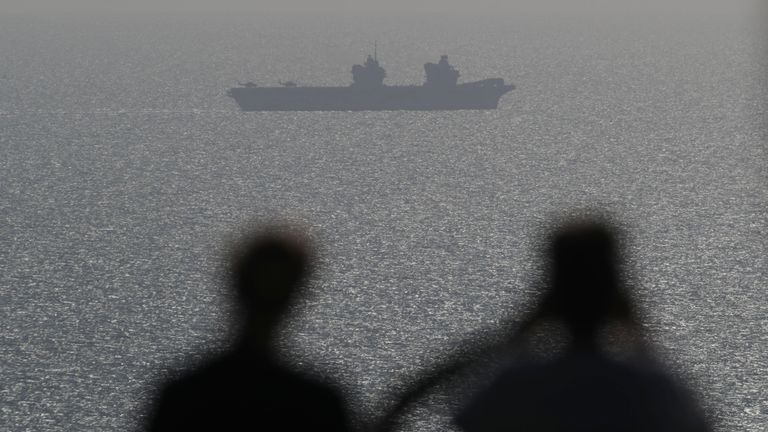 HMS Queen Elizabeth off the coast of the Isle of Wight ahead