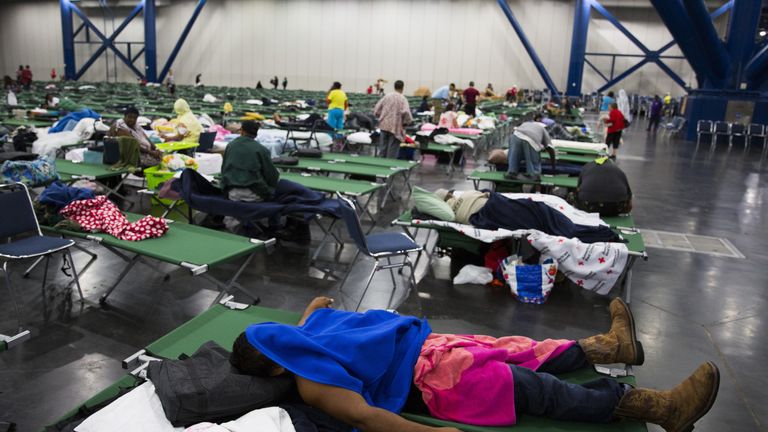 Evacuees from flooded parts of Houston rest at an American Red Cross shelter