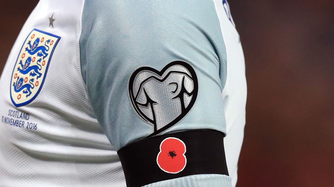 An England player wears a poppy arm band during a World Cup qualifier in 2016