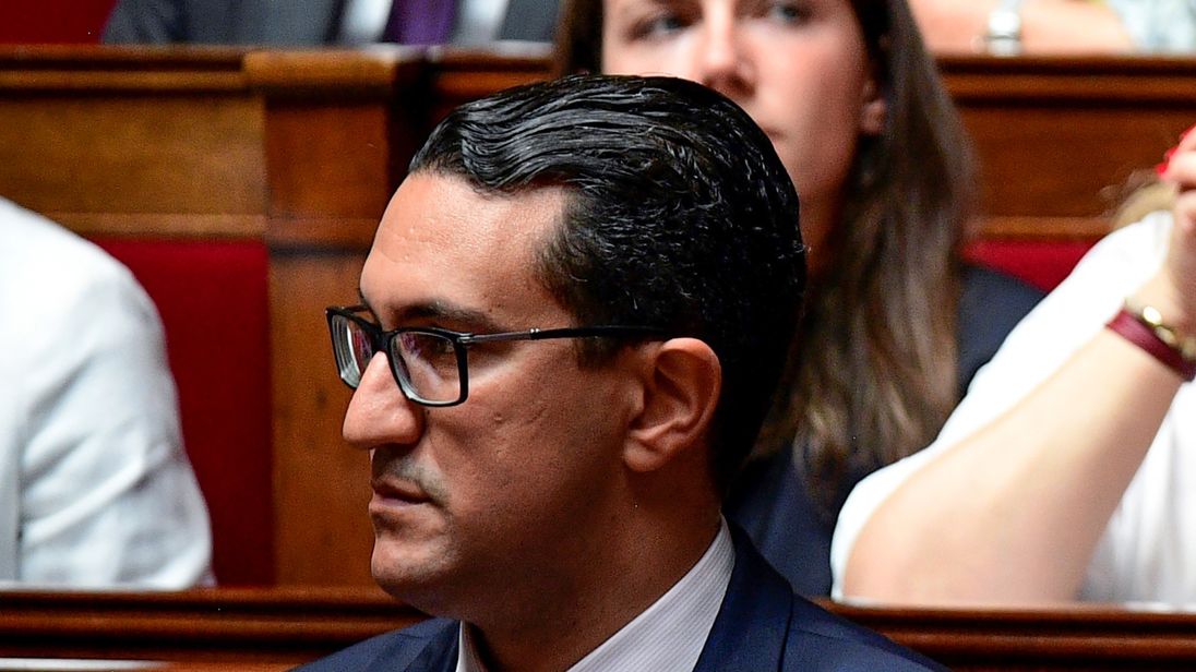 This photo taken on July 5, 2017 at the French National Assembly in Paris shows French La Republique en Marche (LREM) party member of Parliament, M'jid El Guerrab attending a session of questions to the Government. French La Republique en Marche (REM) party MP M'jid El Guerrab was placed in custody on September 1, 2017, two days after his violent altercation with Socialist politician Boris Faure, who has been hospitalized since, police sources confirmed on September 1, 2017.