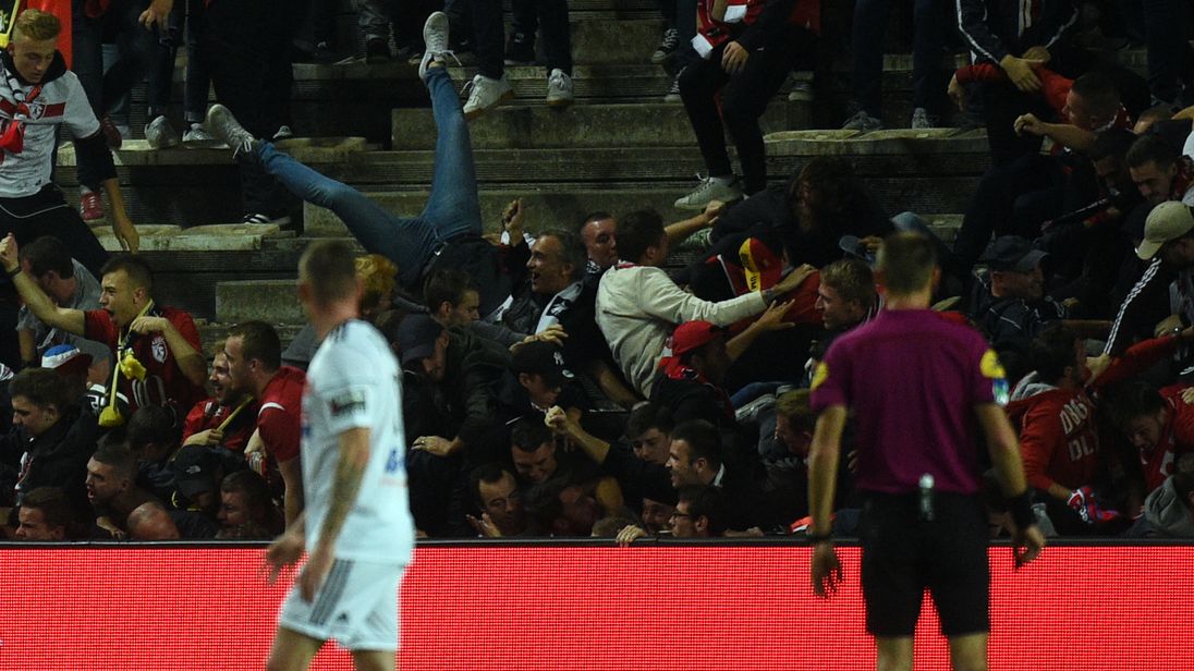 The stadium barrier collapsed as away fans celebrated a goal