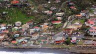 Damaged homes from Hurricane Maria are shown in this aerial photo over the island of Dominica