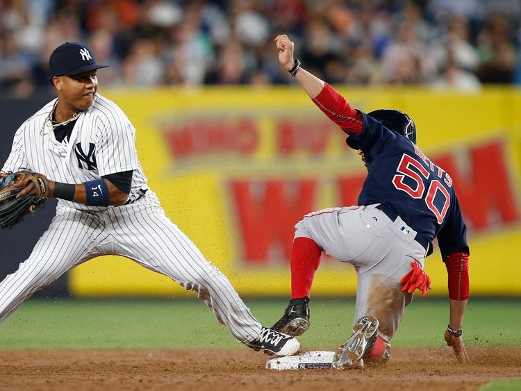 Mookie Betts of the Red Sox and Starlin Castro of the Yankees during a game on 31 August