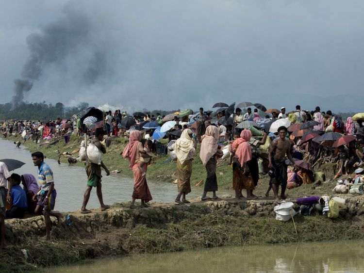 Smoke billows above what is believed to be a burning village in Rakhine state