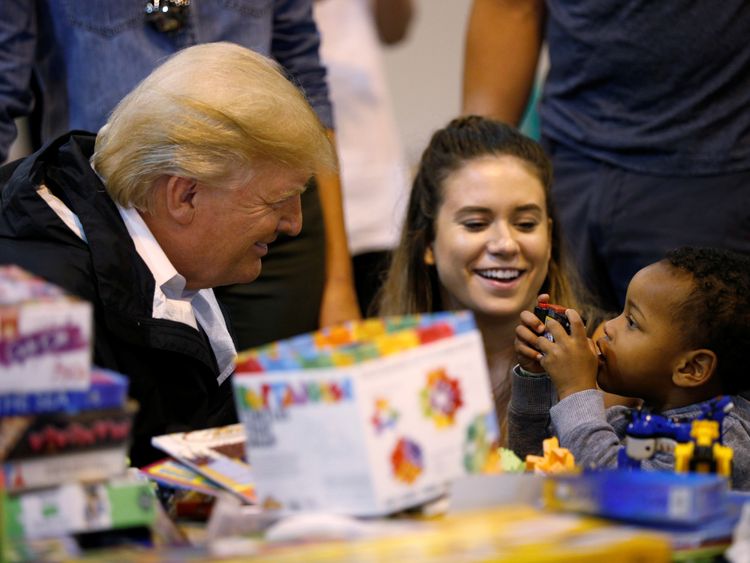 U.S. President Donald Trump visits with survivors of Hurricane Harvey at a relief center in Houston, Texas, U.S., September 2, 2017. REUTERS/Kevin Lamarque