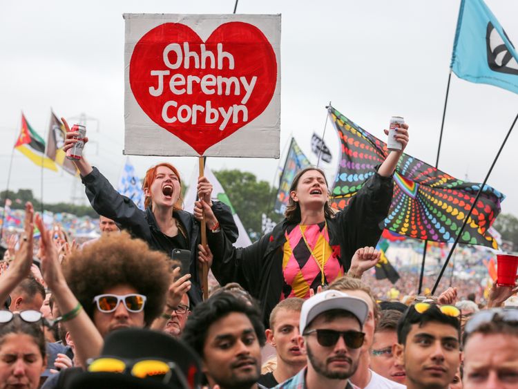 A Corbyn fan chants his name at Glastonbury Festival