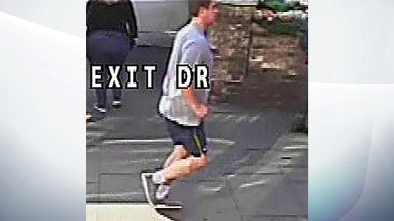CCTV still of a suspect police wish to trace in relation to the assault of a woman who was pushed in front of a London bus by the jogger
