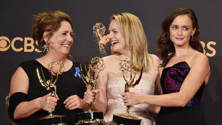 (L-R) Actors Ann Dowd, Elisabeth Moss, and Alexis Bledel, winners of the award for Outstanding Drama Series for The Handmaid&#39;s Tale