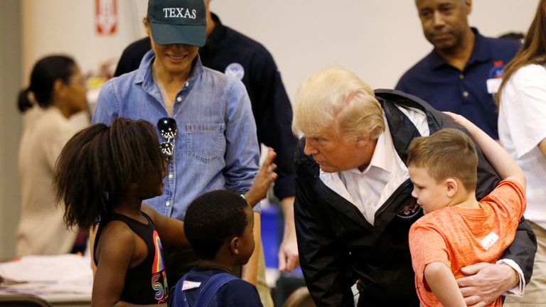 U.S. President Donald Trump and first lady Melania Trump visit with flood survivors of Hurricane Harvey at a relief center in Houston, Texas, U.S., September 2, 2017. REUTERS/Kevin Lamarque