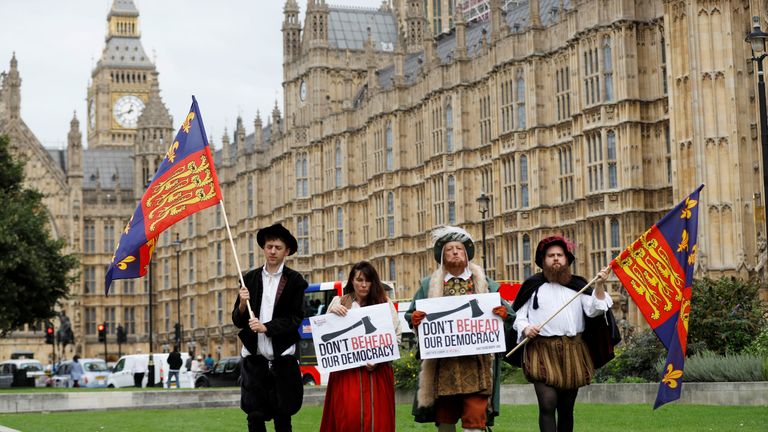 A man dressed as King Henry VIII protests outside the Houses of Parliament as MP's debate the European Union Withdrawal Bill
