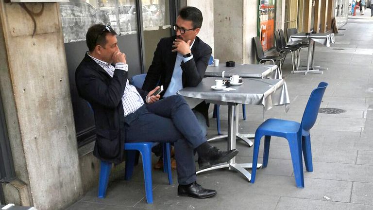 Jose Manuel Costas Estevez pictured with Mark Acklom in a Geneva cafe