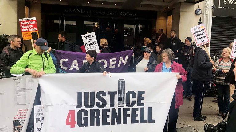 Protesters outside the Grenfell Tower public inquiry in central London 