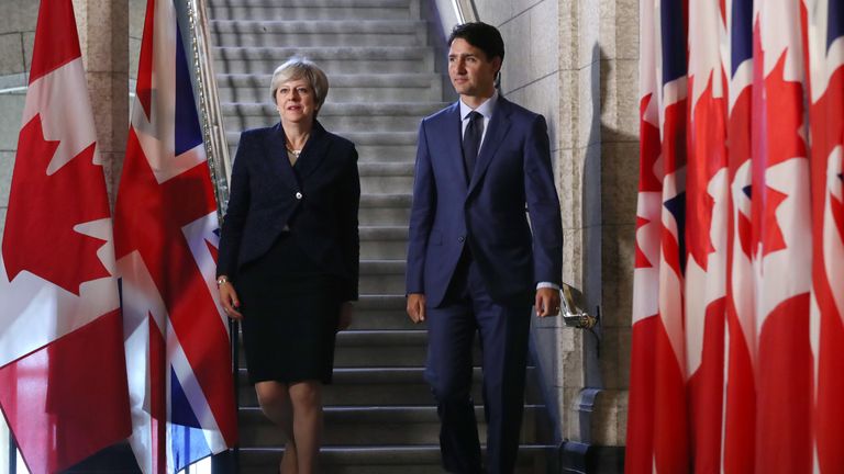 Theresa May&#39;s in Canada to discuss a post-Brexit trade deal with Canada
