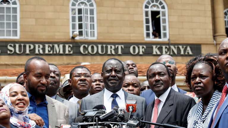 Opposition leader Raila Odinga (centre) hailed it as &#39;a precedent-setting ruling&#39;