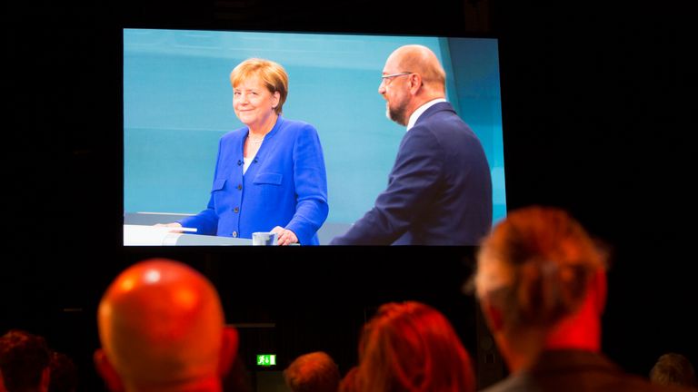 BERLIN, GERMANY - SEPTEMBER 03: Journalists at the Adlershof television studios watch the live broadcast of the television debate between German Chancellor and Christian Democrat (CDU) Angela Merkel and her main opponent, German Social Democrat (SPD) and chancellor candidate Martin Schulz, on September 3, 2017 in Berlin, Germany. Germany will hold federal elections on September 24 and so far Merkel, who is seeking a fourth term, has a double-digit lead over Schulz. (Photo by Omer Messinger/Getty