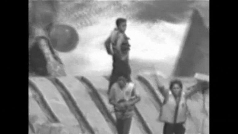 The three were stranded on the upturned vessel&#39;s hull