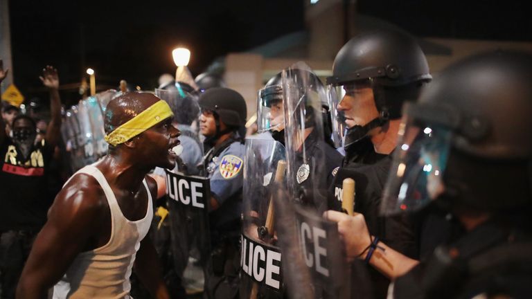 Demonstrators confront police while protesting the acquittal of former St. Louis police officer Jason Stockley on September 16, 2017 in St. Louis, Missouri