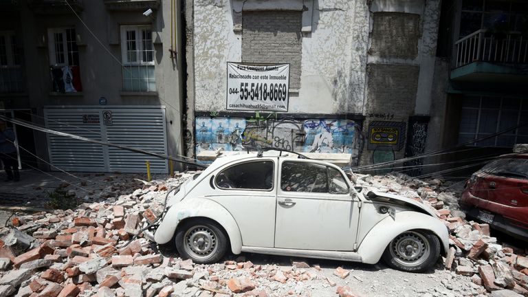 A car crushed by falling debris in Mexico City