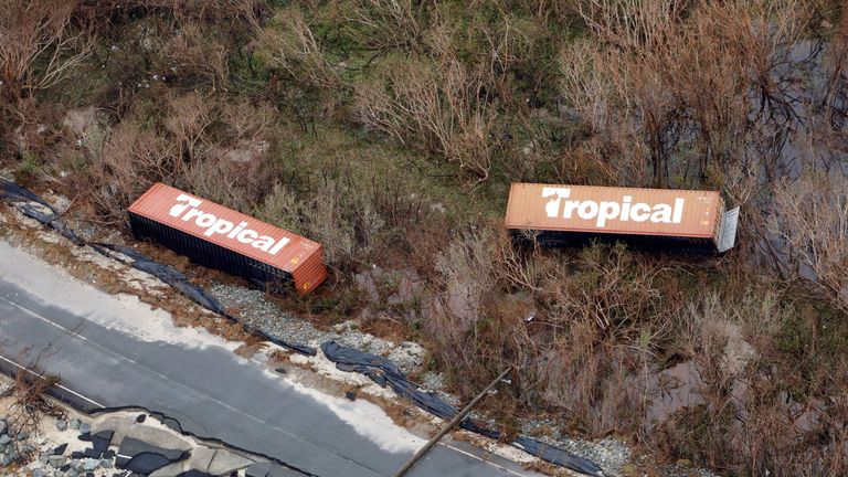 Toppled shipping containers and destroyed road in St. Croix, U.S. Virgin Islands