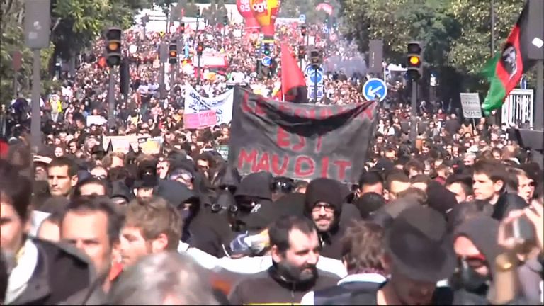 Tens of thousands of people take to the streets of Paris to demonstrate against Emmanuel Macron's labour reforms