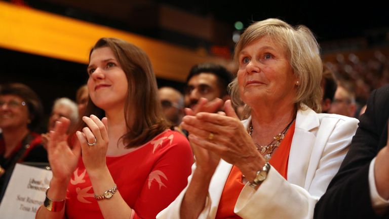 Deputy leader Jo Swinson and Sir Vince Cable&#39;s wife Rachel Smith applaud as they listen to his speech